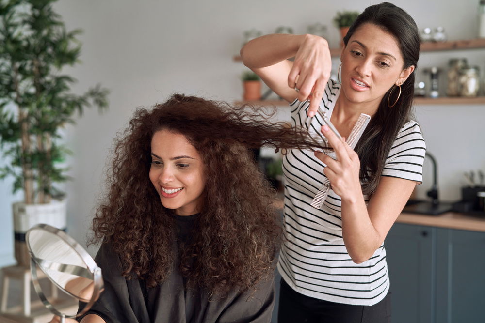 Happy,Women,While,Trimming,Their,Hair,At,Home