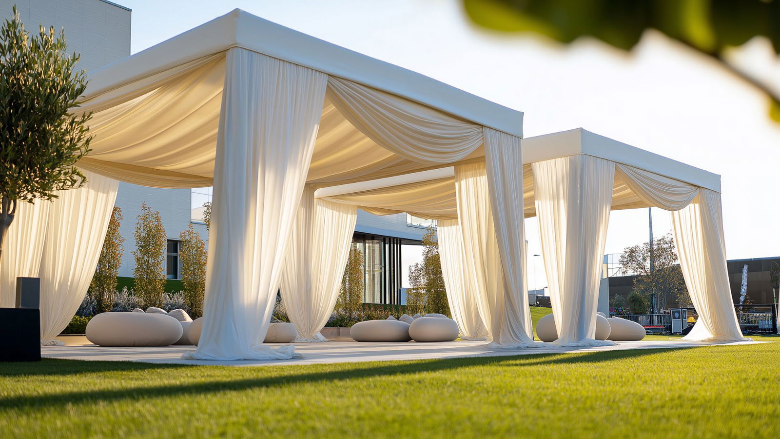 A white canopy with white curtains AI-generated content may be incorrect.